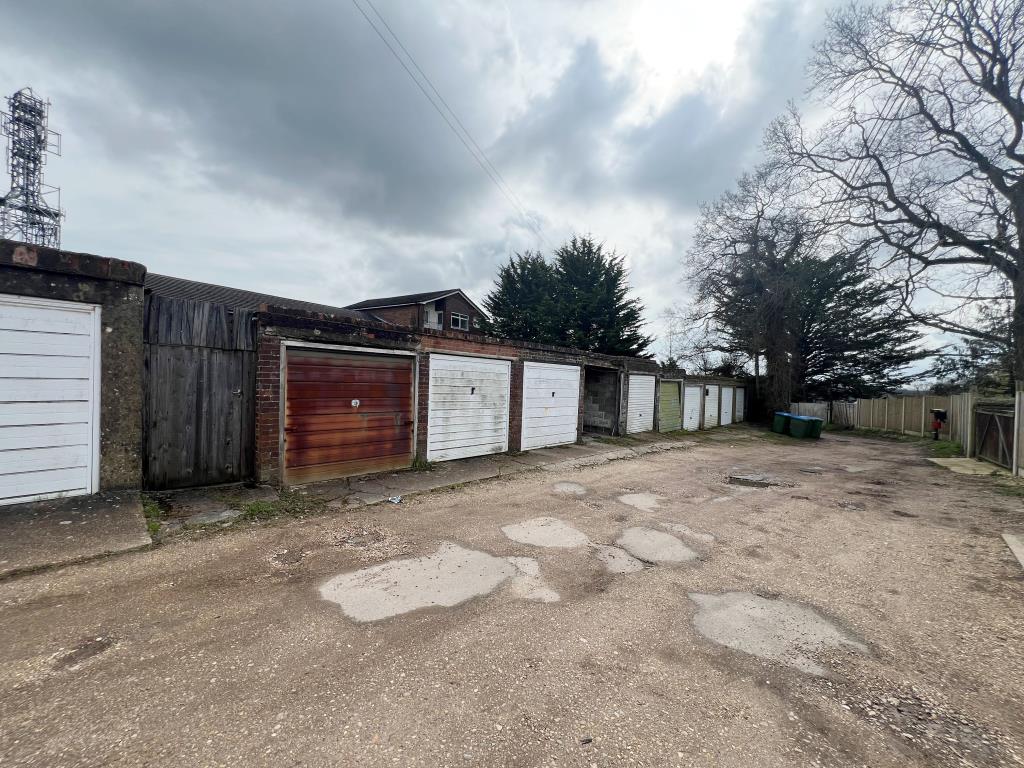 Lot: 41 - FREEHOLD BLOCK OF TEN GARAGES - Block of garages with access road